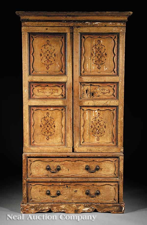 French Painted and Stenciled Pine Cabinet: An Antique French Painted and Stenciled Pine Cabinet, 19th c., molded cornice above paneled scalloped doors, two scalloped drawers on scalloped plinth base, height 76 3/8 in., width 43 in., depth 16 i