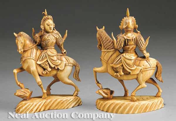 Carved Tinted Ivory Mongol Equestrian Warriors: A Pair of Chinese Carved Tinted Ivory Mongol Equestrian Warriors, carved in mirror image, one an archer, the other a swordsman, base with inset mother-of-pearl cartouche with Qianlong four character r