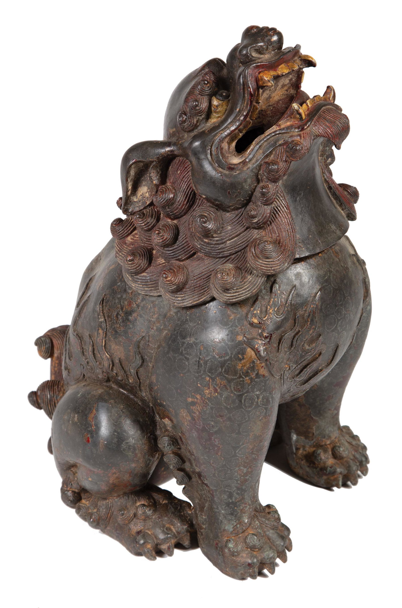 Chinese Patinated Metal Buddhist Lion Censer: Chinese Patinated Metal Buddhist Lion Censer , modeled seated on its haunches with its face turned upward, remnant paint, h. 13 1/2 in