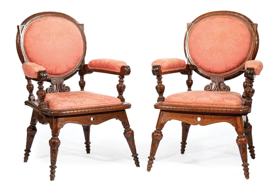 Pair of Renaissance Carved Walnut Armchairs: Pair of Renaissance Carved Walnut Armchairs , c. 1880, each with round back with egg and dart surround, padded scrolled arms, incised vasiform supports, shaped pierced apron, spiral-carved legs, h. 40