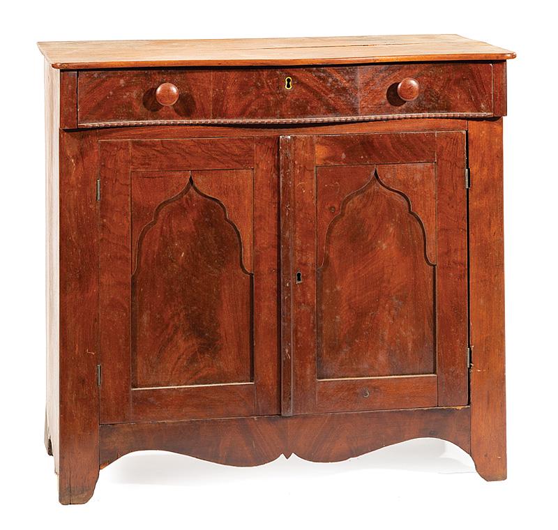 American Late Classical Mahogany Commode: American Late Classical Mahogany Commode , c. 1840, serpentine top with conforming long drawer, ribbon molding, gothic doors, shaped apron, lacking marble or stone top, h. 28 in., w. 29 1/4 in., d. 14