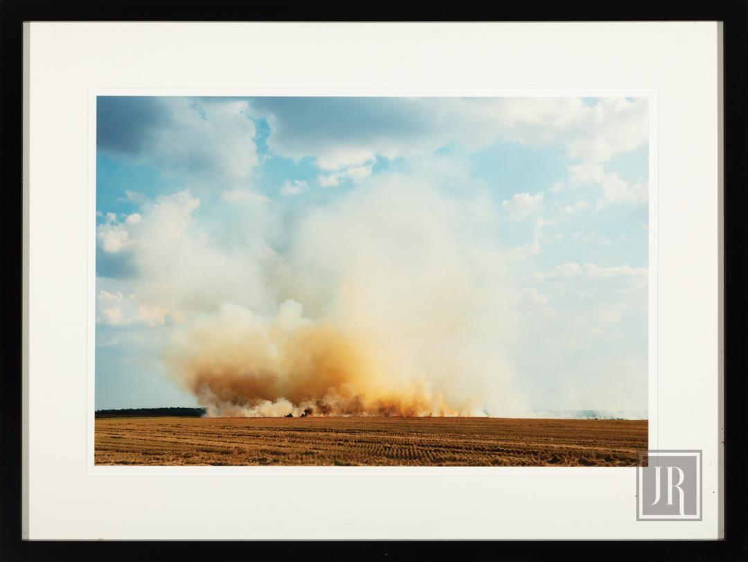 Paul Costello (American/New Orleans, b. 1971): Paul Costello (American/New Orleans, b. 1971) , "Burning Wheat Fields near Hollywood Plantation, Benoit, Mississippi", archival inkjet print on paper, unsigned, sheet 20 in. x 28 in., framed . Provena