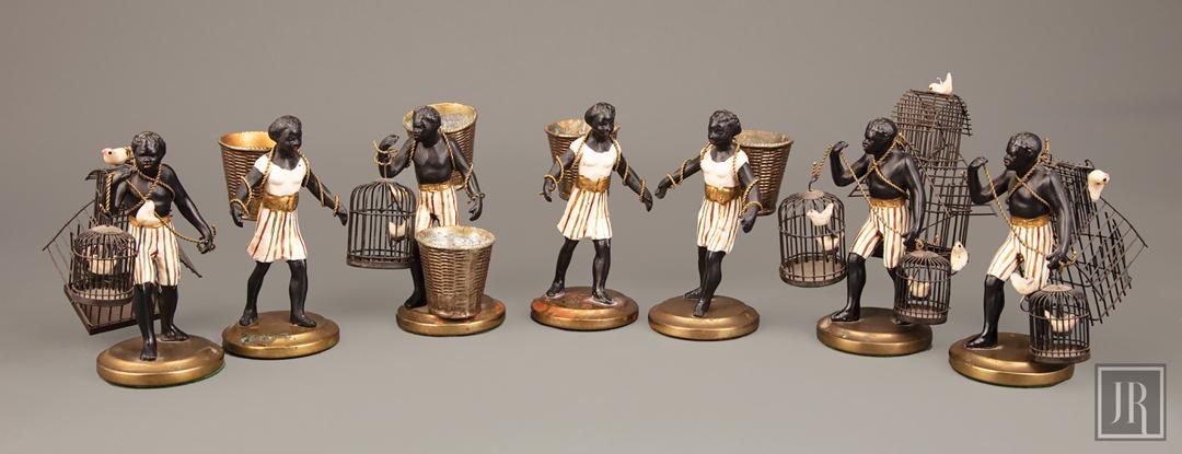 Polychromed Marketplace Table Garniture Figures: Large Group of Polychromed Marketplace Table Garniture Figures. (7 pcs.) Provenance: Estate of Julia Evans Reed