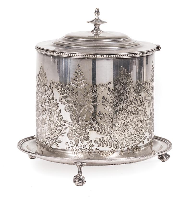English Late Victorian Silverplate Biscuit Box: English Late Victorian Silverplate Biscuit Box , c. 1890, flat chased fern motif encircling cylindrical body with a hinged cover, the rimmed base raised on claw and ball feet, h. 7 1/2 in., dia. 7 1/4