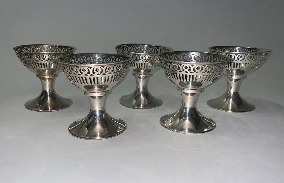 Sterling Silver Frames for Dessert Coupes: Five American Sterling Silver Frames for Dessert Coupes , marked, reticulated rim, h. 3 in., dia. 2 7/8 in