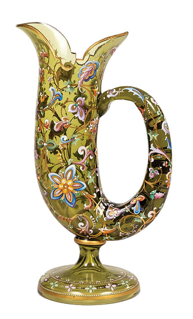 Moser Enameled Green Glass Ewer: Moser Enameled Green Glass Ewer , late 19th/early 20th c., horn of plenty form, shaped lip, body with applied scrolling vines and arabesques, stemmed foot, unsigned, h. 11 in