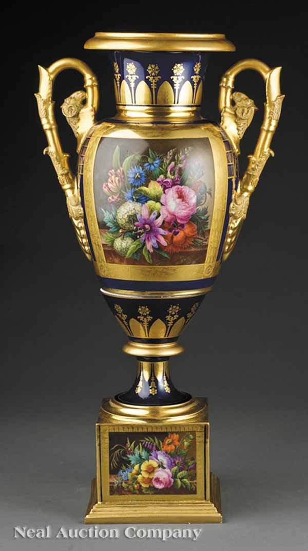 Paris Porcelain Cobalt, Gilt Garniture Vase: A Paris Porcelain Cobalt, Gilt and Polychrome-Decorated Garniture Vase , c. 1820, reserved with a finely painted floral still life on the body and base, within rectangular gilt stenciled borders, the 