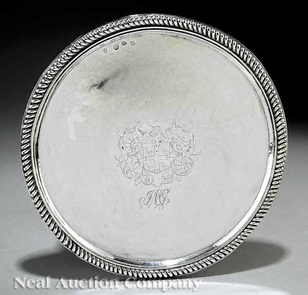 John Sutton Sterling Silver Tray or Salver: A Charles II Sterling Silver Tray or Salver , probably John Sutton, London, 1679, mark ent. 1674-1675; circular with gadrooned rim and handsome engraved armorial; now lacking the footed base and prese