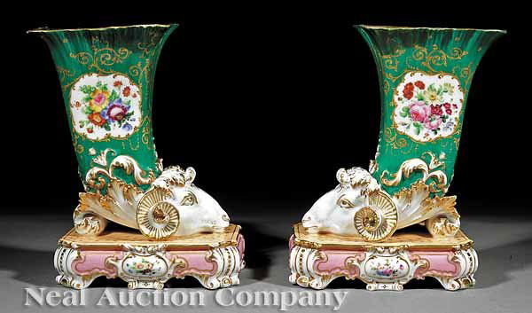 Pair of Paris Porcelain Rhyton Vases: A Good Pair of Paris Porcelain Rhyton Vases, early 19th c., in the manner of Jacob Petit, each modeled with ram's head issuing a rectangular flared green ground vase, painted with flowers and decorate