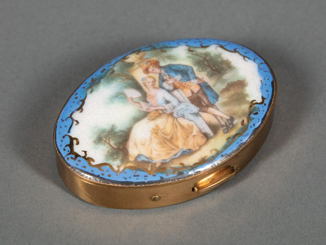 French Sevres-Style Enamel Compact: French Sevres-Style Polychrome and Gilt Enamel Compact , lid with courting couple, blue ground, mirrored interior, fitted powder puff and filter, l. 3 in., w. 2 1/4 in