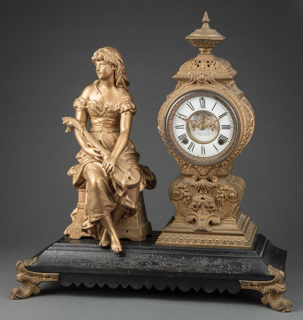 Ansonia Gilt Meal Figural Clock: Ansonia Gilt Meal Figural Clock , late 19thc., figure with lute,, h. 21 in., d. 20 1/4 in., d. 8 in