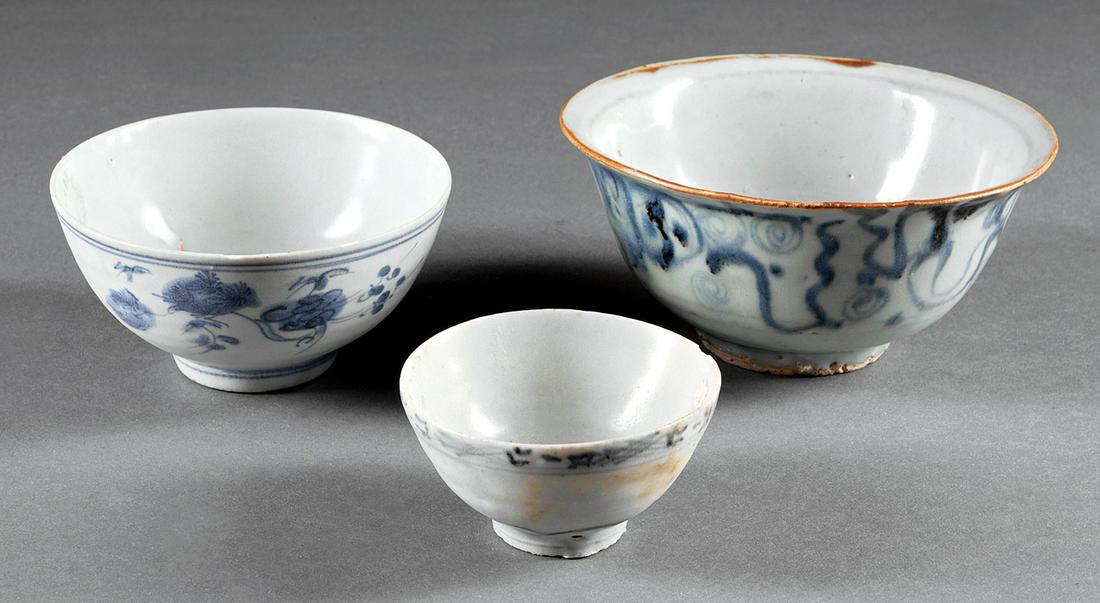 Chinese Blue and White Porcelain Bowls: Three Chinese Blue and White Porcelain Bowls , probably Ming Dynasty (1368-1644), one with "Charlotte Horstmann & Gerald Godfrey" label, h. 2 3/4 in., 2 1/4 in., and 1 3/4 in . Provenance: New Orleans