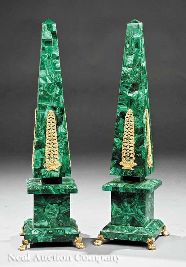 A Pair of Gilt Bronze-Mounted Malachite Obelisks: A Pair of Gilt Bronze-Mounted Malachite Obelisks, stepped bases on paw feet, height 28 in., width 8 in., depth 8 in