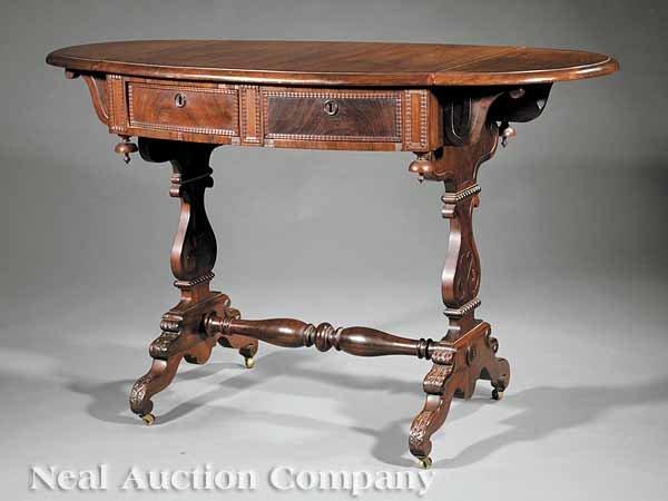 A J. & J.W. Meeks Rosewood Sofa Table: An American Late Classical Carved Rosewood Sofa Table, c. 1840, labeled "J. & J.W. Meeks Makers No. 14 Vesey St. New York", molded top with shaped drop leaves, ripple molded drawers on one side, penda