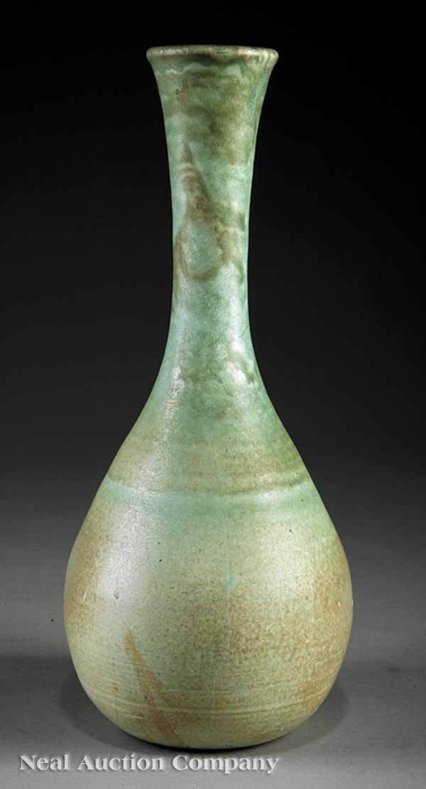 A Shearwater Art Pottery Grecian Bud Vase: A Shearwater Art Pottery Grecian Bud Vase, 1960s, by Peter Anderson, in a Desert Sage glaze, base with quarter-sized Shearwater stamp, accompanied by a certificate of authenticity, height 13 1/4 in