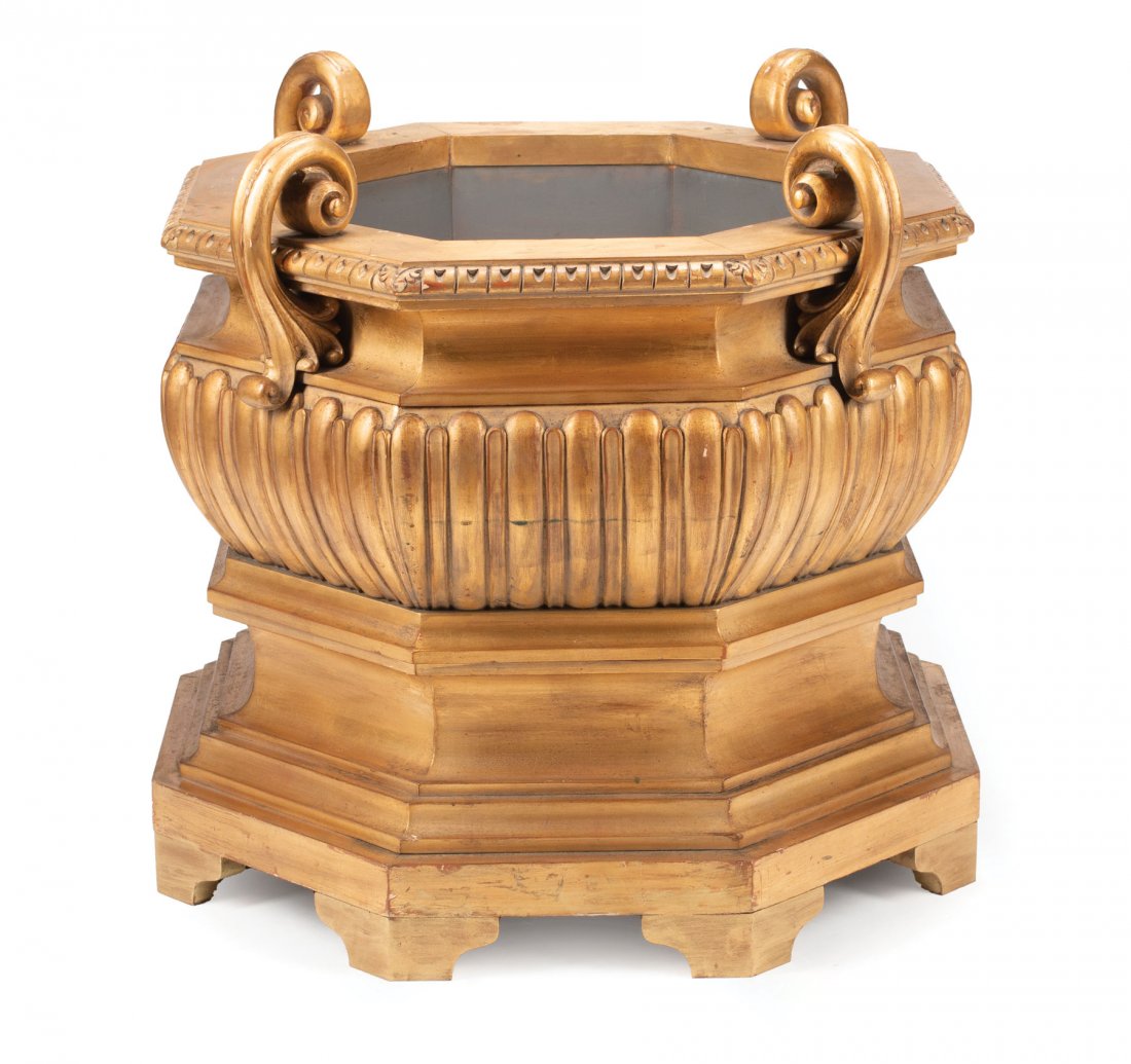 Italian Carved Giltwood Jardinieres: Italian Neoclassical-Style Carved Giltwood Jardiniere , octagonal form, scroll finials, lobed body, molded conforming base, bracket feet , h. 31 in., dia. 33 in