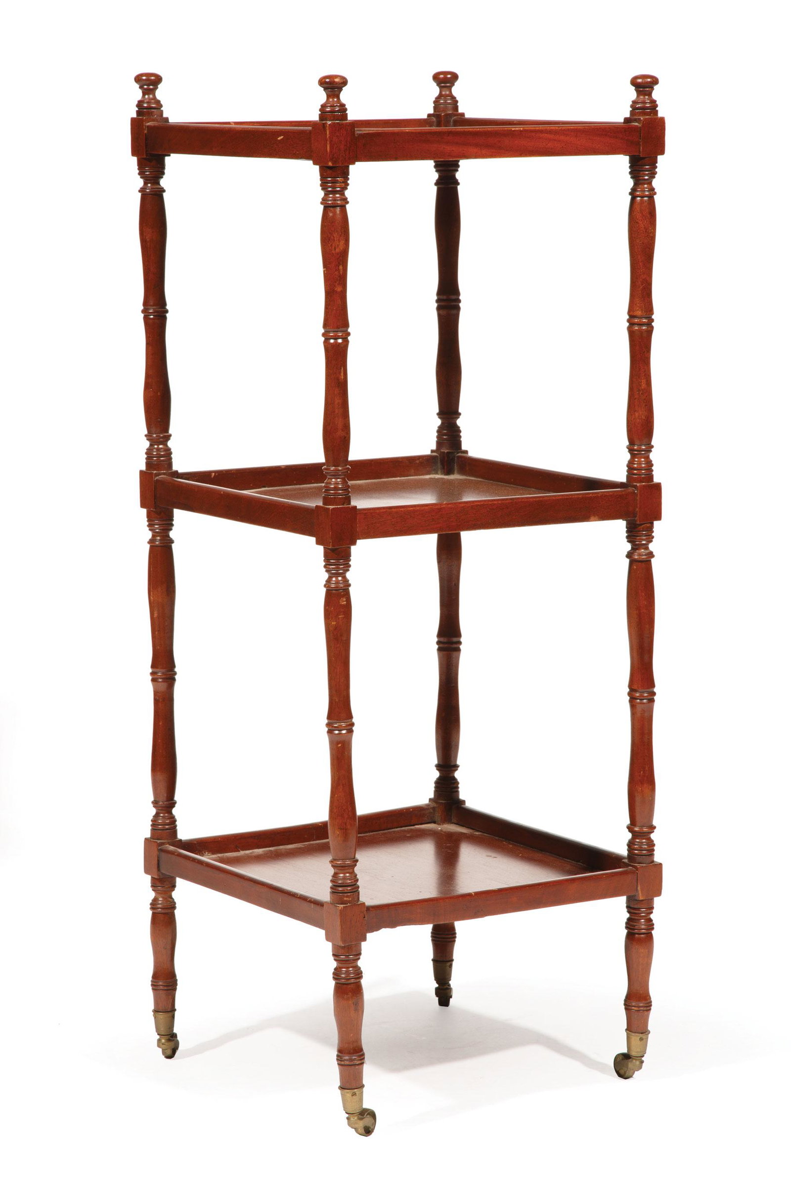 Regency Mahogany Etagere: Regency Mahogany Etagere , 19th c., three galleried shelves, ring-turned and baluster supports, brass caps, casters, h. 42 1/2 in., w. 16 in., d. 16 in