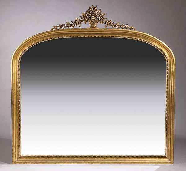 Antique Louis Philippe-Style Giltwo: An Antique Louis Philippe-Style Giltwood Overmantel Mirror, the crest having a basket of flowers with trailing garlands, the frame with beaded surround, height 63 in., width 61 in * NO RETURNS ARE ACC