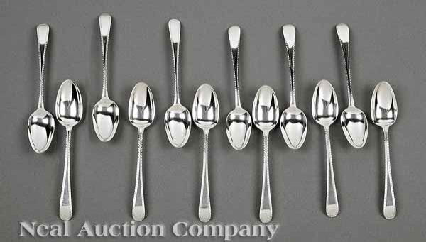 Hester Bateman Sterling Silver Dessert Spoons: A Set of 12 George III Sterling Silver Dessert Spoons, Hester Bateman, London, 1776 & 1778, Old English pattern with bright-cut edge, length 6 7/8 in., weight 14.05 troy ozs