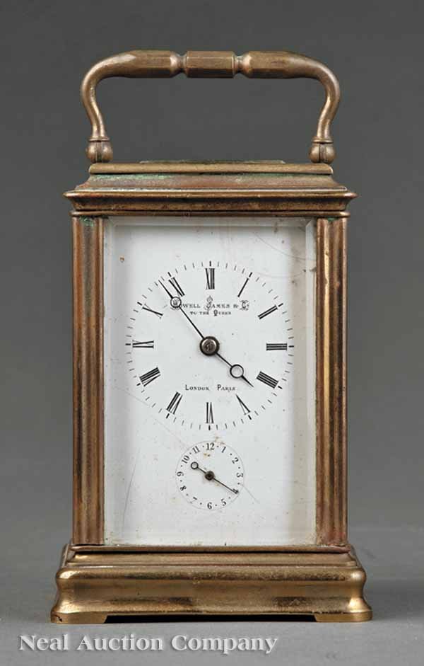 Brass Carriage Clock, ret. Howell James & Co.: An Antique French Brass Carriage Clock, late 19th c., Japy Frères movement, dial marked with retailer "Howell James & Co., London, Paris", with visible escapement on top, alarm feature, height 5 1/4 