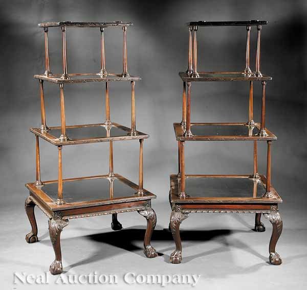 Pair of Edwardian Mahogany and Mirrored Etageres: A Pair of Edwardian Mahogany and Mirrored Etageres, each having four graduated square tiers inset with mirrors, rosette corners, tapered spindled supports, gadrooned molding, acanthus carved cabriole 