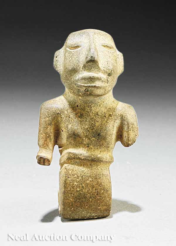 A Mezcala Carved Figural Form Implement: A Mezcala Carved Figural Form Implement, c. 200 BC - AD 300, grayish stone tapering to a sharp edge below the torso, height 3 in.