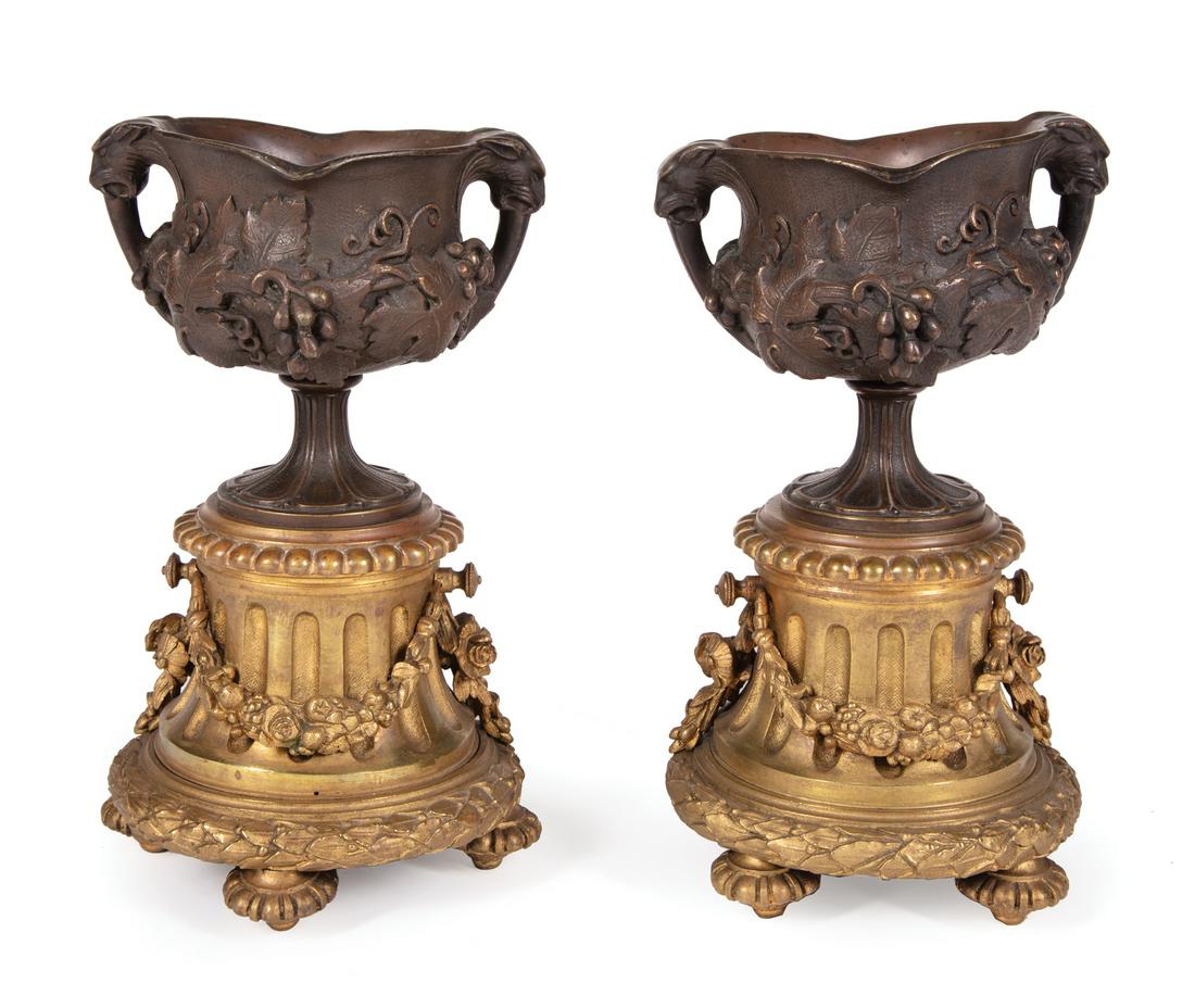 Louis XVI-Style Gilt and Patinated Bronze Urns: Pair of Louis XVI-Style Gilt and Patinated Bronze Urns , cast with panther handles and grapevines, h. 9 1/2 in., w. 5 3/4 in., d. 5 3/4 in