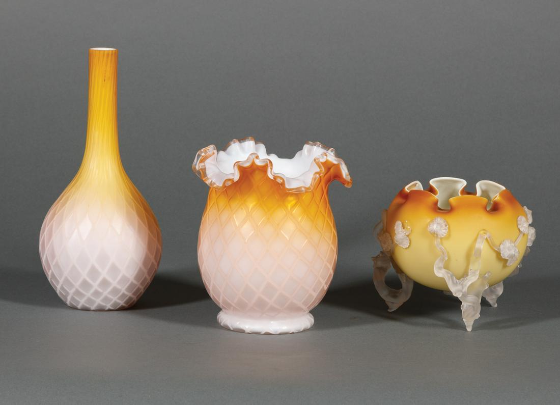 Two Satin Diamond Quilted Art Glass Vases: Two Satin Diamond Quilted Art Glass Vases , possibly Thomas Webb, incl. ruffle rim vase, h. 6 1/4 in.; and bottle vase, h. 9 1/4 in.; together with peach satin glass footed rosebowl, 19th c., applied