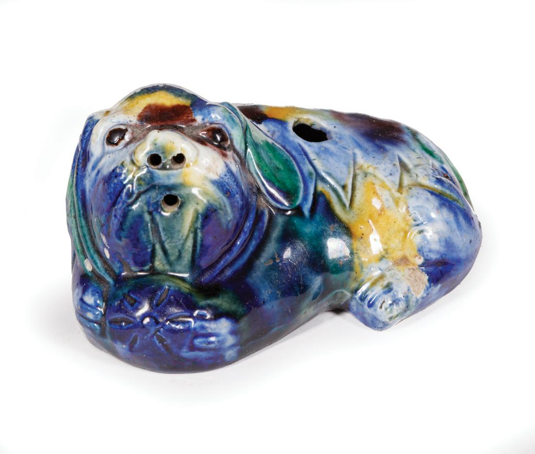 Chinese Glazed Porcelain Figural Water Dropper: Chinese Glazed Porcelain Figural Water Dropper , Qing Dynasty (1644-1911), modeled as a recumbent Buddhist lion or dog pup cradling a "brocade" ball, h. 2 in., l. 4 1/8 in