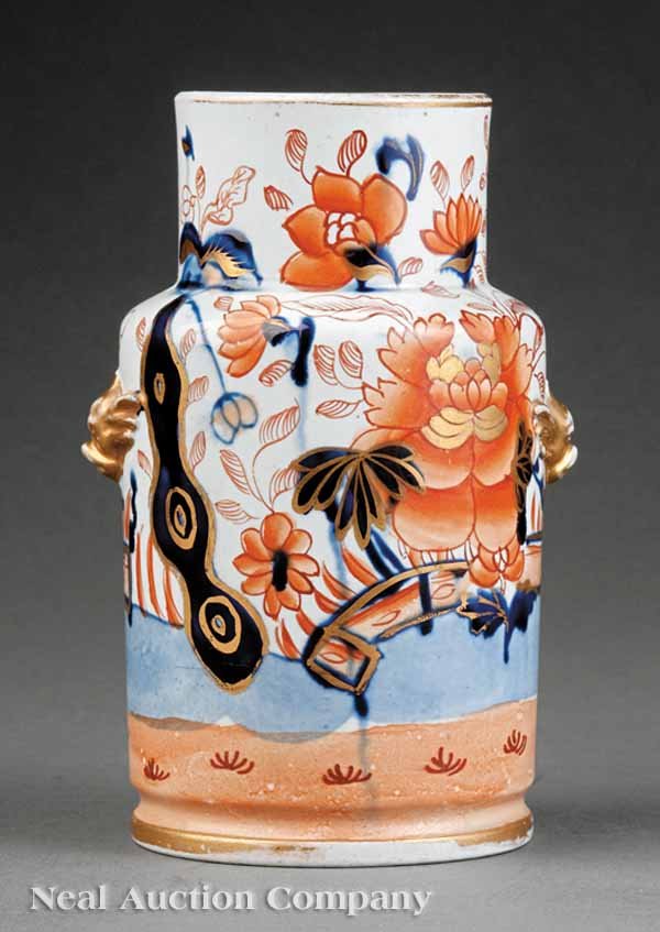 AMason's Ironstone Cylindrical Vase: A Mason's Ironstone "Japan" or "Chrysanthemum" Pattern Cylindrical Shouldered Vase, c. 1815-1825, applied gilt grotesque masks, circular impressed mark, height 6 in., diameter 3 1/2 in