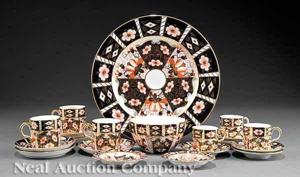 Royal Crown Derby "Imari" Dessert Service: A Royal Crown Derby "Imari" Pattern Dessert Service, comprising a serving plate, waste bowl, 6 coffee cans with saucers, 6 demitasse cans with saucers, and 2 small bonbon dishes, plate diameter 11 1/2