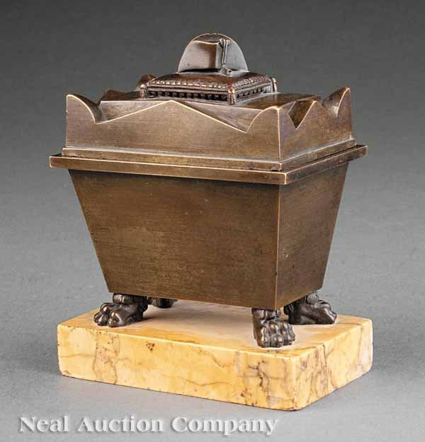 Grand Tour Patinated Bronze, Marble Encrier: A Grand Tour Patinated Bronze and Sienna Marble Encrier, 19th c., sarcophagus form, the lid having Napoleon's tricorn resting on a pillow; the interior fitted with two wells and two pen holders, and e