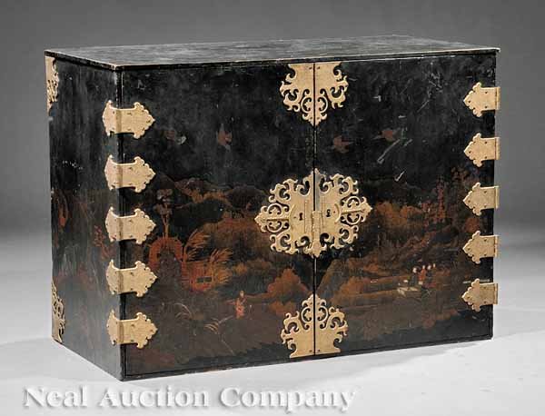 Gilt Bronze-Mounted and Japanned Cabinet: A George III Gilt Bronze-Mounted and Japanned Cabinet, 18th c. and later, the rectangular case profusely mounted with strap hinges and elaborate escutcheons, the interior well fitted with drawers and 