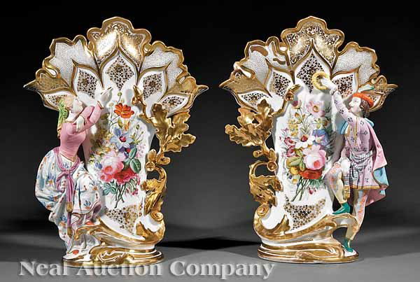 Paris Gilt and Polychromed Porcelain Vases: A Pair of Paris Gilt and Polychromed Porcelain Figural Vases, 19th c., in the manner of Jacob Petit, each with foliate rim, floral reserve and figures of a troubadour and lady, height 15 1/2 in