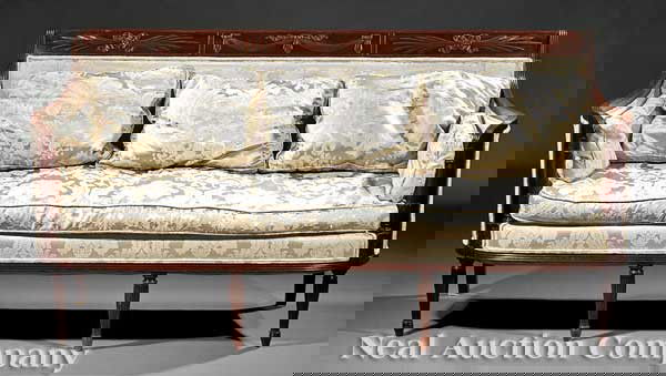 American Federal-Style Carved Mahony Sofa: A Fine Antique American Federal-Style Carved Mahogany Sofa, after an example by Duncan Phyfe, crest with swagged ribbons and sheaves of wheat, carved reeded arms, reeded foliate-carved uprights, pater