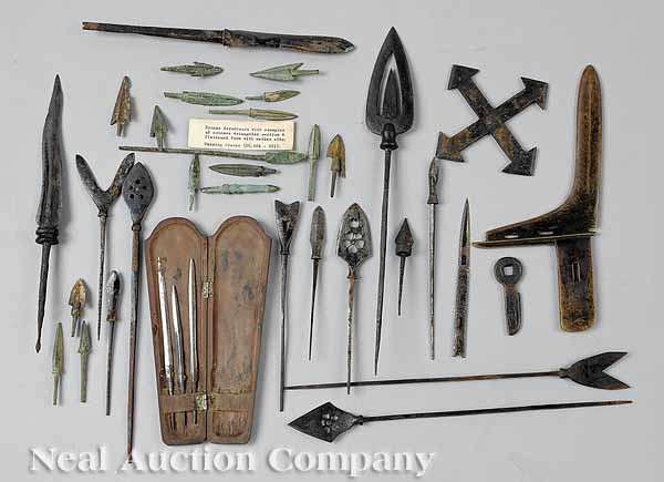 Chinese Bronze and Iron Spearheads and Arrowheads: A Large Collection of Chinese Bronze and Iron Spearheads and Arrowheads, Warring States (BC 464-221) and later, over 80 pieces of various forms; together with a bronze halberd, a throwing star, and st