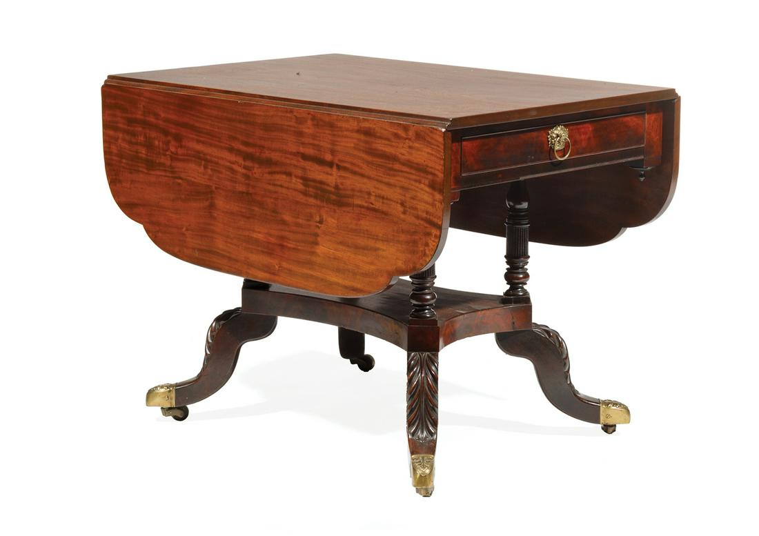 American Classical Pembroke Table: American Classical Pembroke Table, attr. Duncan Phyfe, New York, shaped drop leaves, beaded drawers flanked by pendants, four turned and reeded supports, incurvate plinth, foliate carved legs, brass c