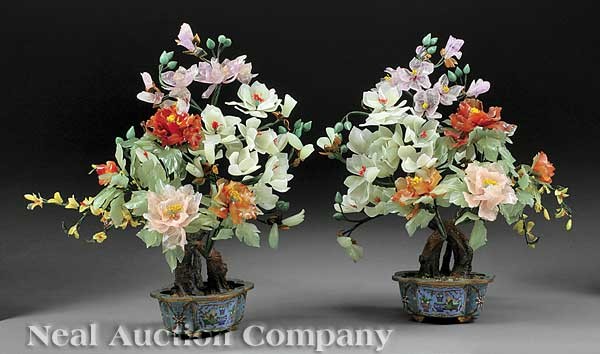 Hardstone Flowering Trees in Cloisonne Jardineres: A Pair of Chinese Carved Hardstone Flowering Trees Set within Cloisonne Enamel Jardineres, multi-colored leaves and flowers raised on naturalistic bark trunks, approx. height 24 in