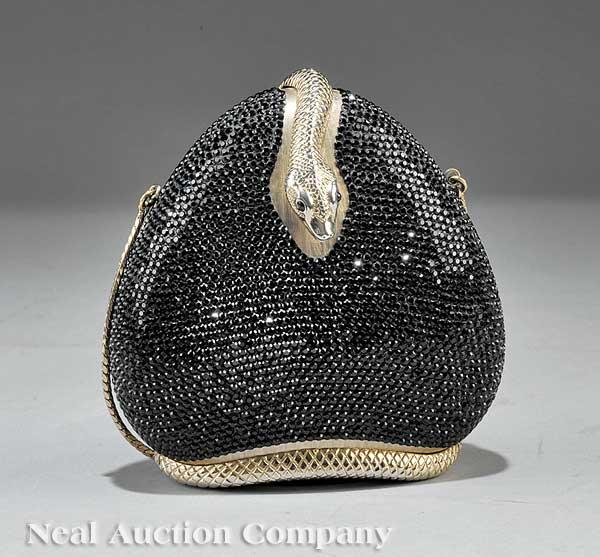 Judith Leiber "Wrapsnake" Minaudière: A Judith Leiber "Wrapsnake" Minaudière, c. 2002-2004, hidden chainlink shoulder strap, retains comb, mirror and coin purse, style no. M28792, signed gold metal plaque, height 5 1/8 in., width 4 3/4 i