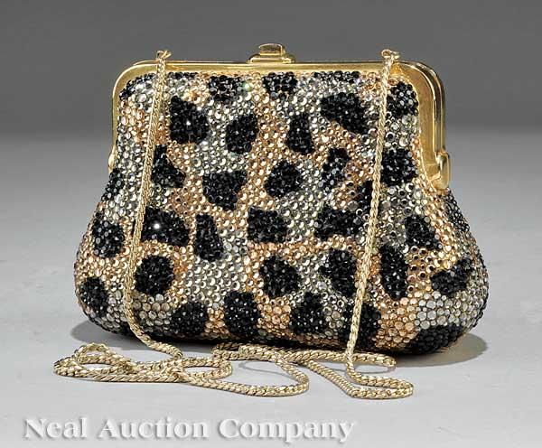 Judith Leiber "Feline" Pattern Minaudière: A Judith Leiber "Feline" Pattern Minaudière, mid-1990s, hidden chainlink strap, signed gold metal plaque, retailer's tag Armen Wardy, Newport Beach, style no. M31049, height 4 7/8 in., width 6 3/4 in