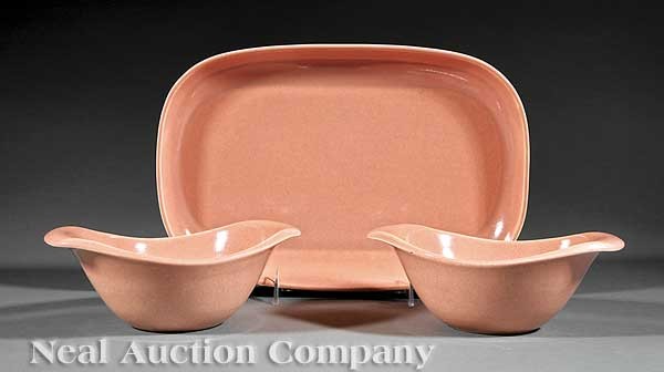 Steubenville Pottery Table Articles by Russel Wri: Three Steubenville Pottery Table Articles designed by Russel Wright (1904 - 1976), mid-20th c., comprising a pair of bowls and a platter, mottled peach glaze, bowl height 3 in., width 8 in., depth 6 i