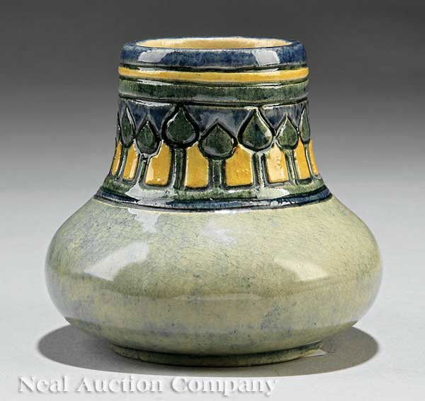 Newcomb College Art Pottery High Glaze Inkwell: A Newcomb College Art Pottery High Glaze Inkwell, 1906, decorated by Rosalie Urqhart with an abstracted grove of trees, lacking lid, base marked with Newcomb cipher, decorator's mark, Joseph Meyer's p