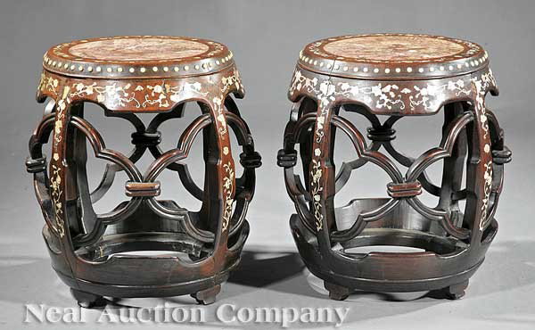 Pair of Chinese Inlaid Rosewood Garden Seats: A Fine Pair of Antique Chinese Inlaid Rosewood Garden Seats, each with circular inset marble top, bowed barrel form with reticulated supports, abalone and mother-of-pearl inlay throughout
