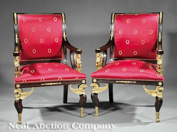 A Pair of Empire-Style Mahogany Armchairs: A Pair of Empire-Style Bronze-Mounted Mahogany Armchairs, each with scrolled back, arms with sphinx supports, rosette blocks, eagle mounted legs ending in talon feet