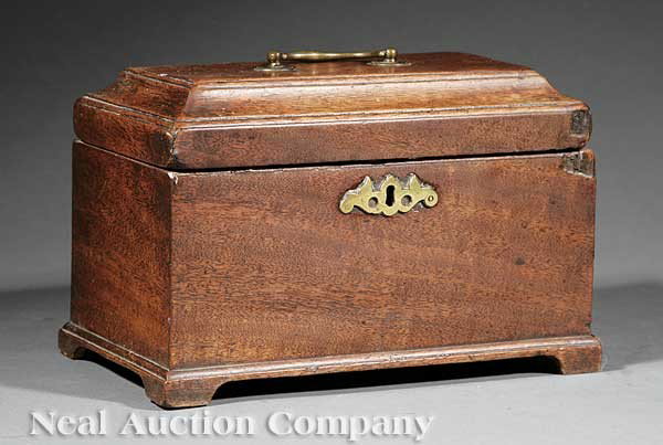 An English Mahogany Chest-Form Tea Caddy: An English Mahogany Chest-Form Tea Caddy, early 19th c., with brass escutcheon and handle, on bracket feet, height 5 3/4 in., length 9 1/2 in. Note: Hinge broken