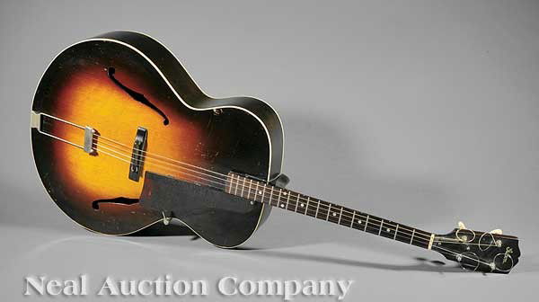 A Vintage Gibson Archtop Tenor Guitar: A Vintage Gibson Archtop Tenor Guitar, 1930s, model TG-7, stamped serial number "1202C" followed by red manuscript "-4", sunburst spruce top with F-holes, elevated fingerboard with dot inlay, original