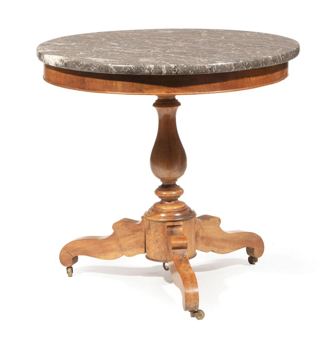 French Restauration Fruitwood Gueridon: French Restauration Fruitwood Gueridon, c. 1840, Gris de Ste. Anne marble top, conforming frieze, vasiform standard, shaped scrolled legs, casters, h. 29 3/4 in., dia. 31 in. Provenance: Bremermann De