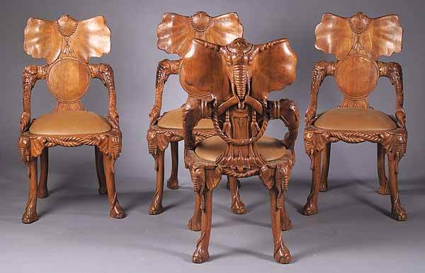 4 Carved Beechwood "Fantasy" Chaises: A Set of Four Carved Beechwood "Fantasy" Chaises inspired by Fournier , each with elephant ear crest, the stiles modeled as rope, drop-in seat, the legs fronted by elephant heads on hoof feet, height