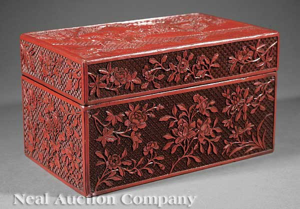 Chinese Cinnabar Lacquer Rectangular Box, Cover: A Very Fine Chinese Cinnabar Lacquer Rectangular Box and Cover, 18th c., the cover finely carved with figures in a mountainous setting, one figure depicted atop a plantain leaf floating on waves besid