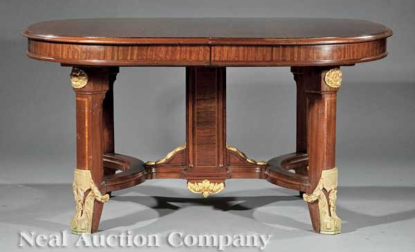 Mahogany, Parquetry, Bronze-Mounted Dining Suite: A Beaux Arts Mahogany, Parquetry and Gilt Bronze-Mounted Dining Suite in the Louis XVI Taste, early 20th c., comprising a buffet, dining table, eight chairs (six with caned backs); the buffet of break